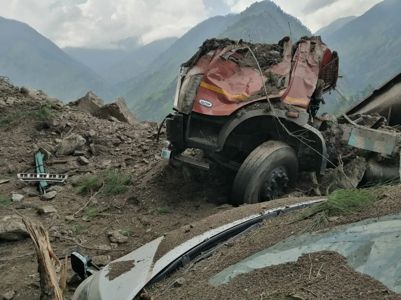 In this handout picture taken on August 11, 2021 and released by the Indo Tibetan Border Police (ITBP) shows wreckage caused by a landslide at the Reckong Peo-Shimla Highway in Kinnaur District.| Photo: AFP