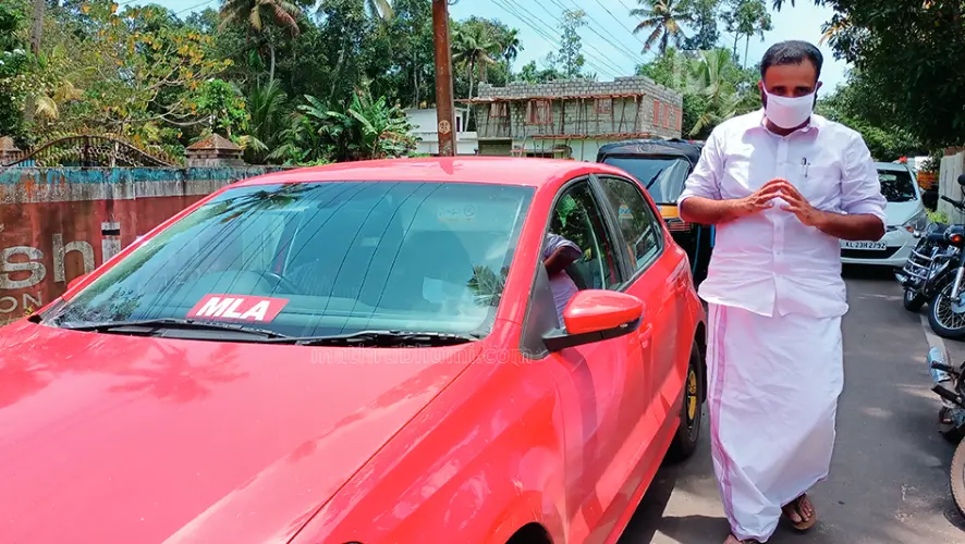 MLA CR Mahesh with his friend's car at a public event