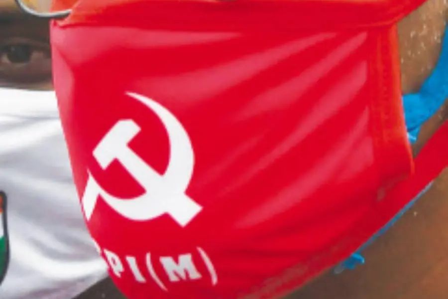 Polling officer suspended for wearing mask with party symbol
