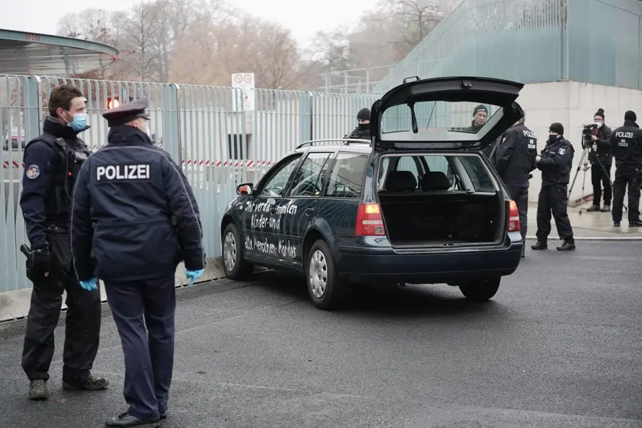 Car hits gate outside Angela Merkel's offices; little damage