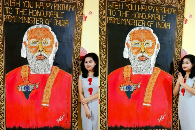 Odisha artist crafts 8-ft-long portrait of Modi using food grains