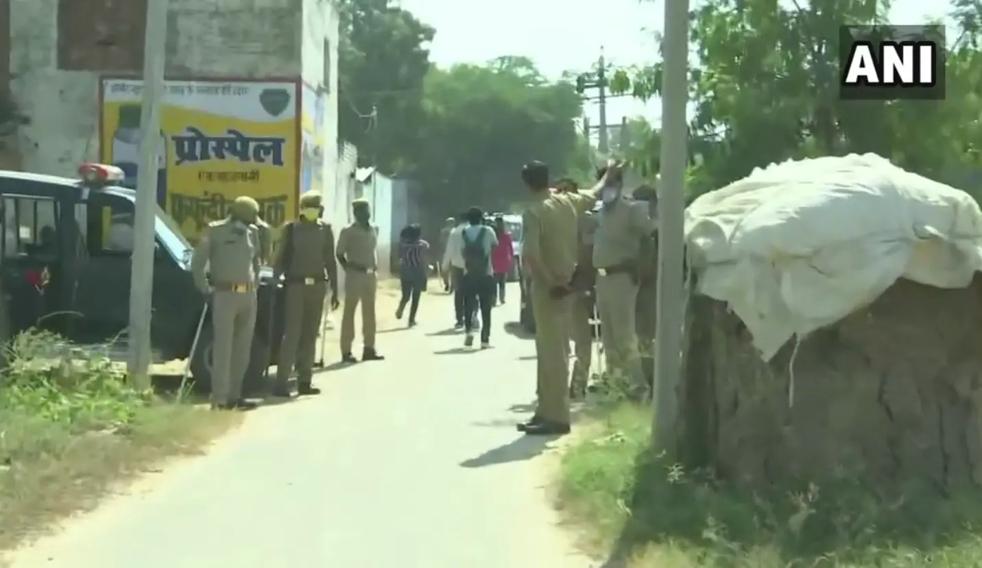 Police officers assembled in Harthras | Photo: ANI