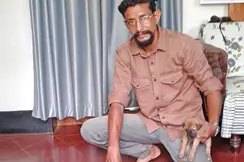 Thrissur youth saves 10 puppies found on highway
