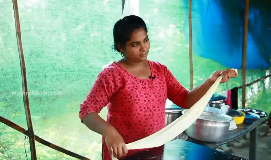 Merinda making porotta