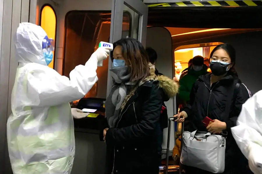 China suspends all public transport in Wuhan city as coronavirus cases climb to 571 with 17 deaths