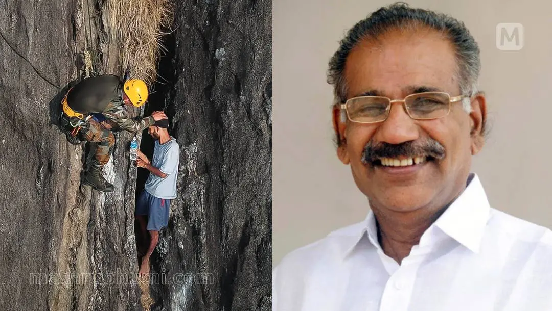 മലമ്പുഴ ചെറാട് കൂര്മ്പാച്ചി മലയിടുക്കില് കുടുങ്ങിയ ബാബുവിന്റെ അടുത്തെത്തിയ സൈനികന് വെള്ളം നല്കുന്നു| എ.കെ.ശശീന്ദ്രന്