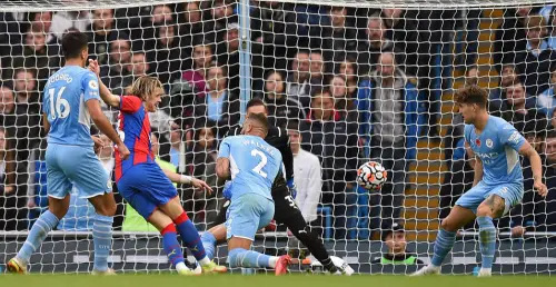 Conor Gallagher (2nd L) shoots to score their second goal against Man City| AFP