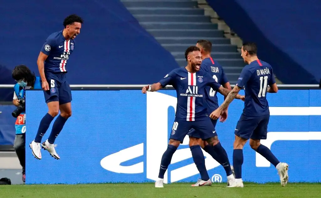 PSG's Marquinhos, left, celebrates with Neymar, center, and Angel Di Maria after scoring against RB Leipzig (AP photo)
