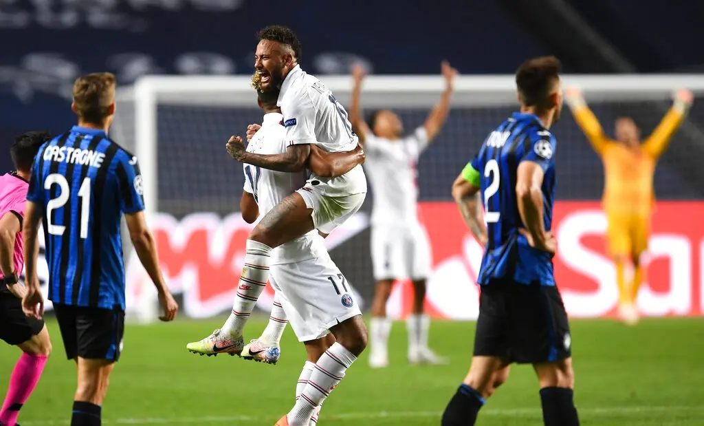 PSG's Neymar celebrates with teammate Eric Maxim Choupo-Moting after defeating Atalanta in the Champions League quarterfinal (AP photo)