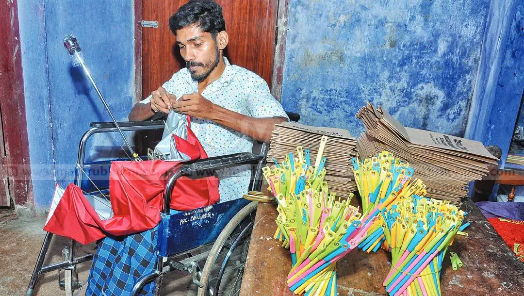 Vishnu making umbrella, sitting on his wheel chair.