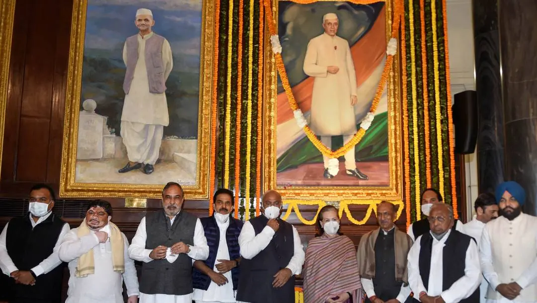 Congress President Sonia Gandhi  pays with party leaders Mallikarjun Kharge, Anand Sharma, J P Agarwal and other after paying tribute to India's first prime minister Jawaharlal Nehru on his birth anniversary, at Parliament in New Delhi, Sunday. Photo: PTI