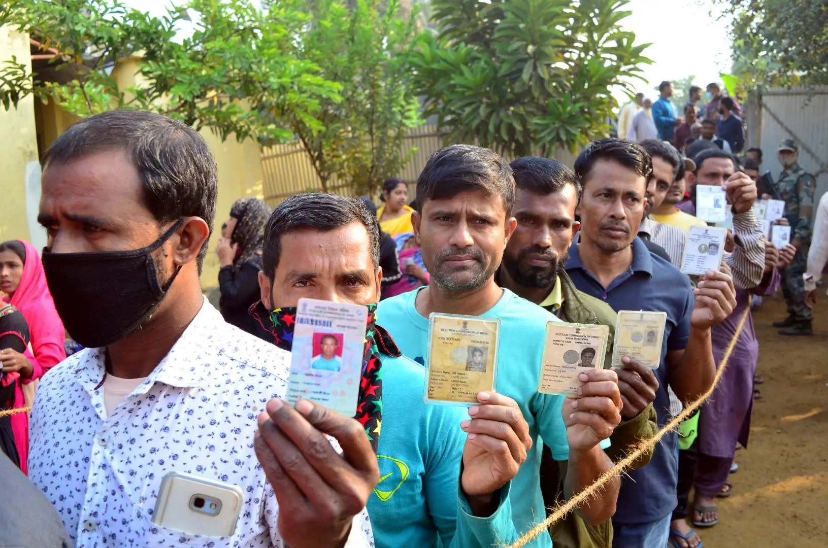 People wait to cast their votes at a polling station in Agartala | Photo: PTI