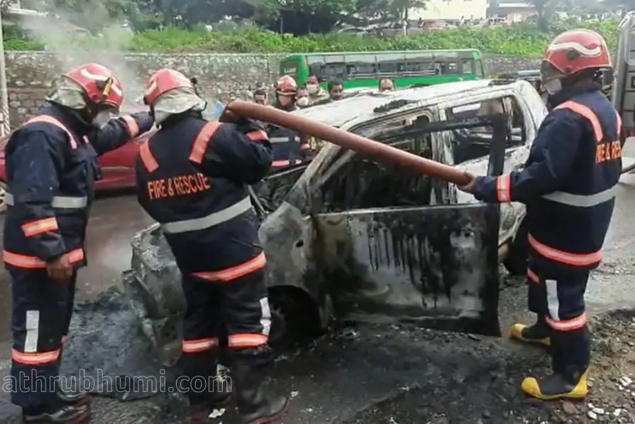 Narrow escape for man and 2 children as running car catches fire in Kozhikode