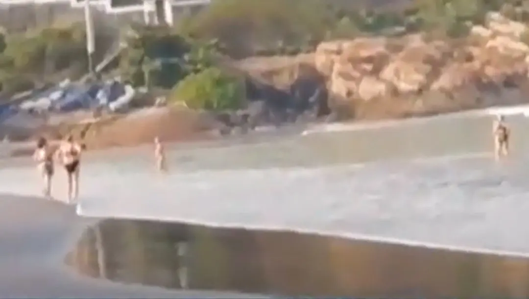 Screen grab of tourists in Kovalam beach