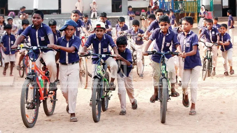 Students of Ariyalloor G.U.P School learning to ride bicycles (Photo: K. B. Satheesh Kumar)