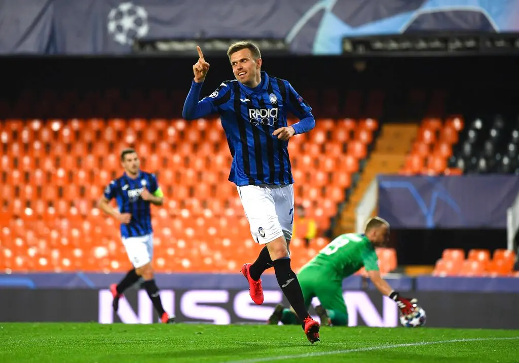 Atalanta's Josip Ilicic celebrates after scoring his side's fourth goal during the Champions League round of 16 second leg match against Valencia (AP photo)