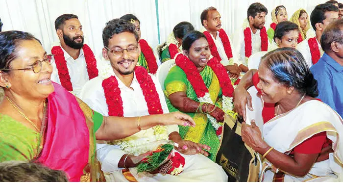 Thrissur natives John Paul and Pushpa (bride and groom)  interacts with their mothers Kochu Mary and Madhavi