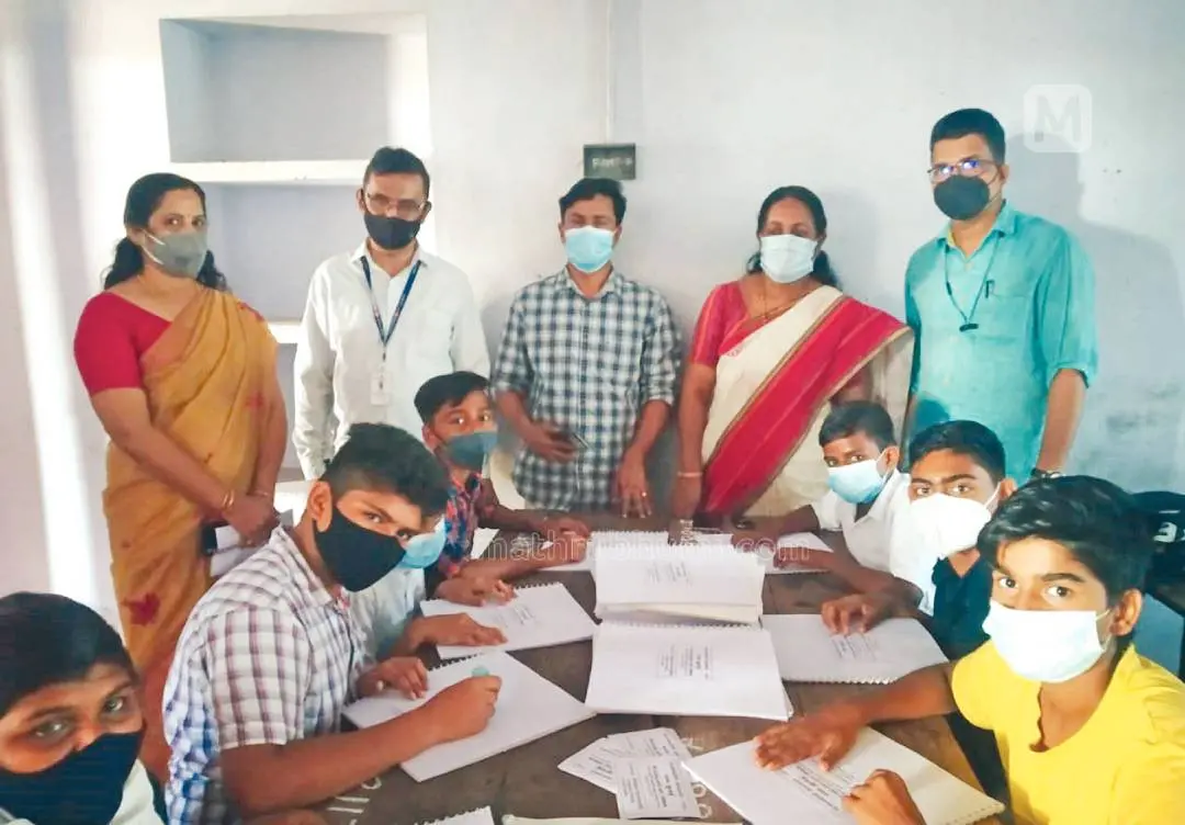 Students and teachers of GVHSS Meenchanda prepare calendar in Braille script | Photo: Mathrubhumi