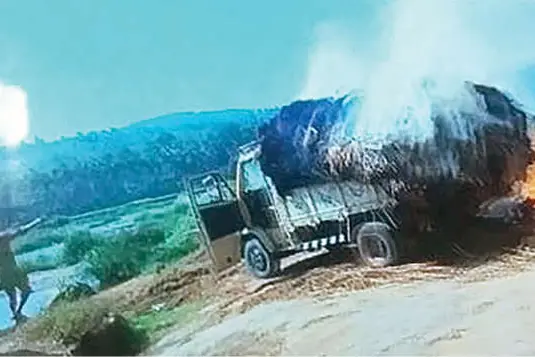 Man drives hay-laden lorry into river after it catches fire in Malappuram