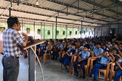 On IMLD, a poet talks to students on his poem prescribed reading in Class III