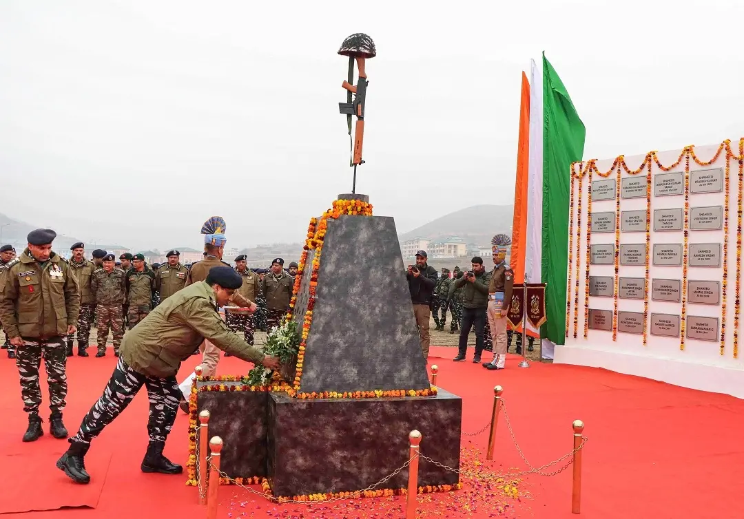 CRPF personnel pay tribute at a memorial to the 40 CRPF jawans, who were killed in the Pulwama terror attack in February last year, at Letapora of Pulwama District of South Kashmir. (PTI Photo)