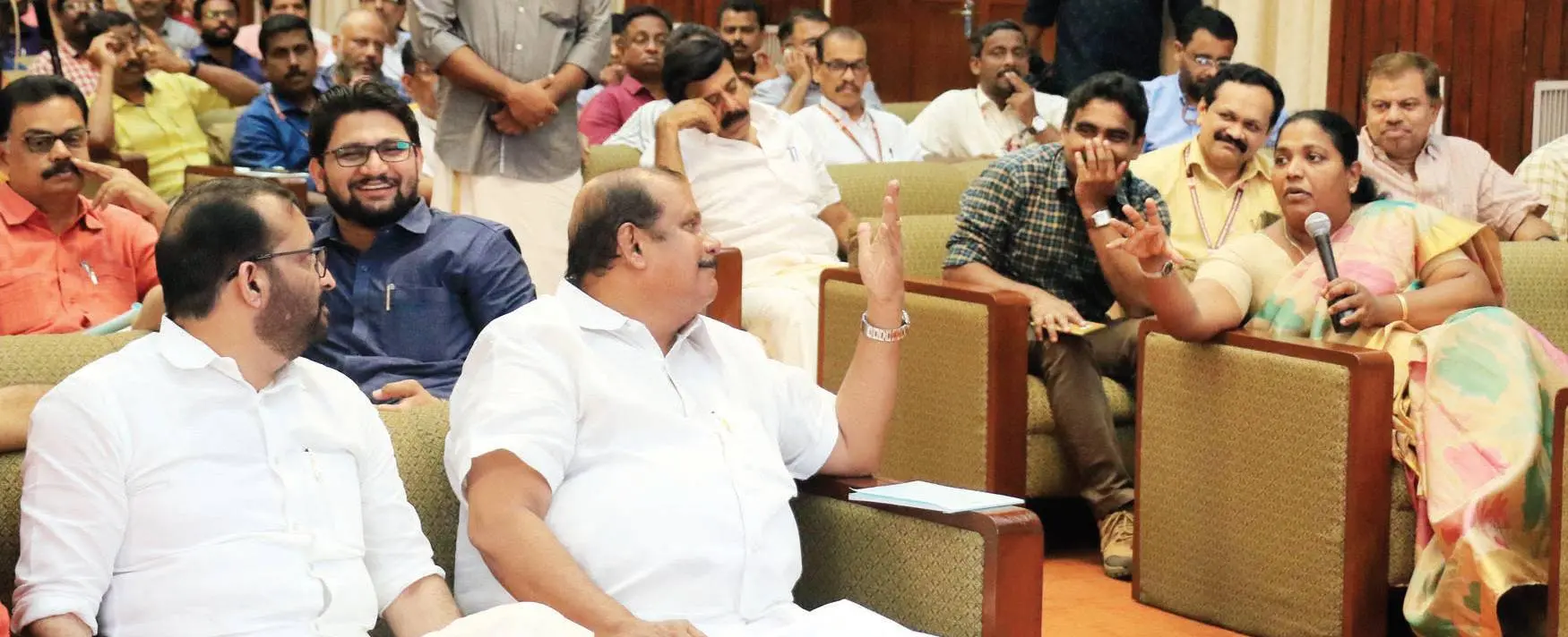 PC George giving a funny gesture to E S Bijimol's question during the introduction of E-Niyamasabha software