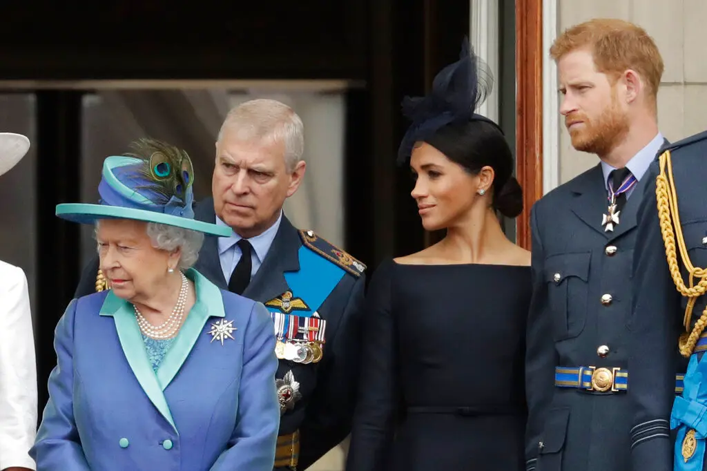 Britain's Queen Elizabeth II, Prince Andrew, Duke of York, Meghan the Duchess of Sussex and Prince Harry Duke of Sussex stand on the balcony of Buckingham Palace in London. (AP file photo)