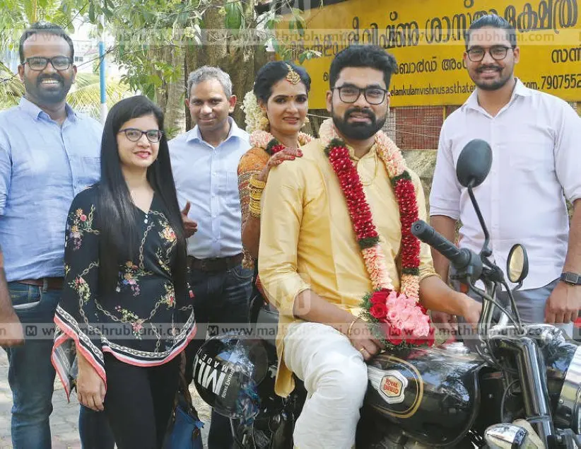 The bride and the groom pose with their friends who came from Delhi to attend the wedding