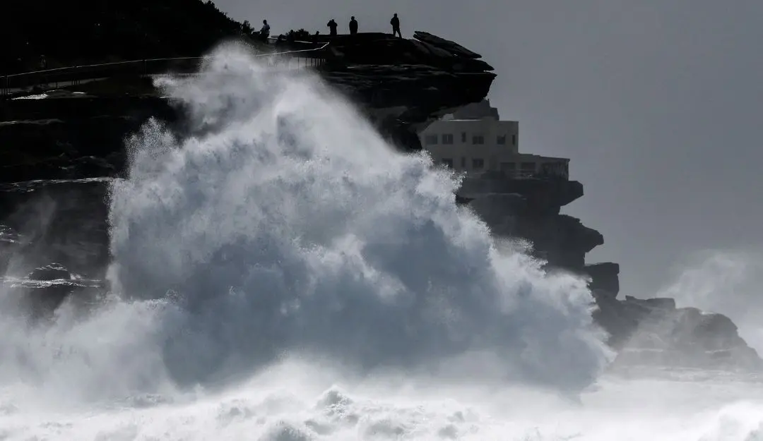 Large waves break onto a headland near Bondi Beach in Sydney on April 1, 2025 (Photo: AFP)