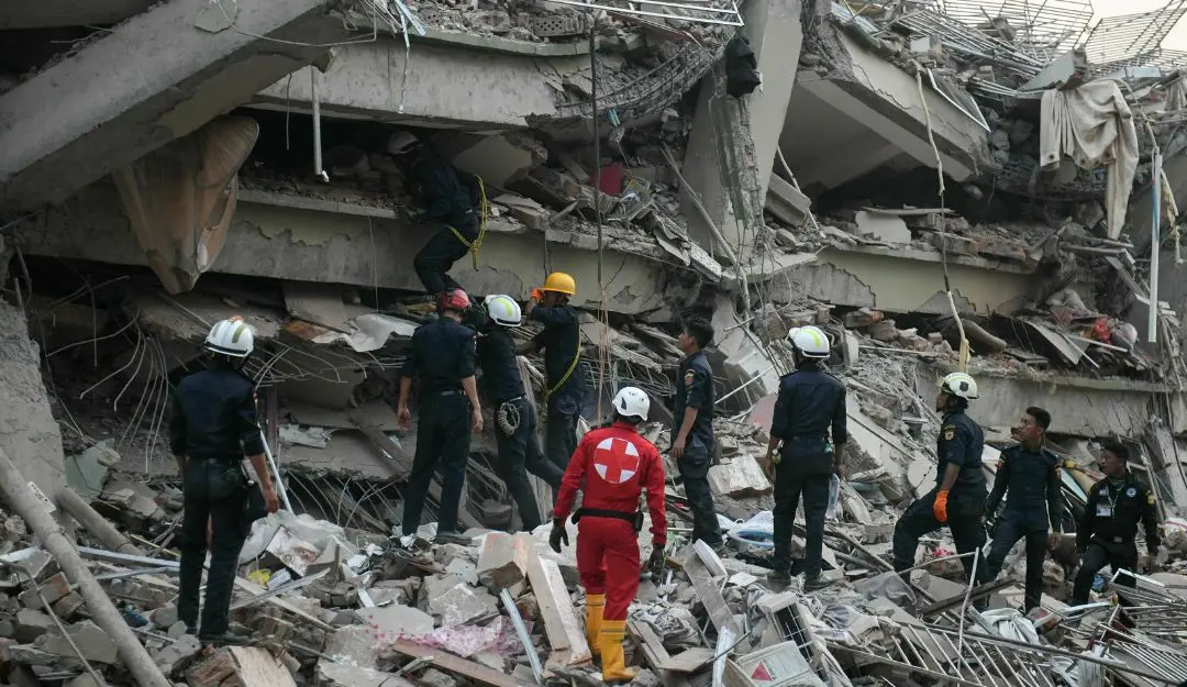 Rescuers search for survivors trapped in the collapsed Sky Villa Condominium building in Mandalay | Photo: AFP