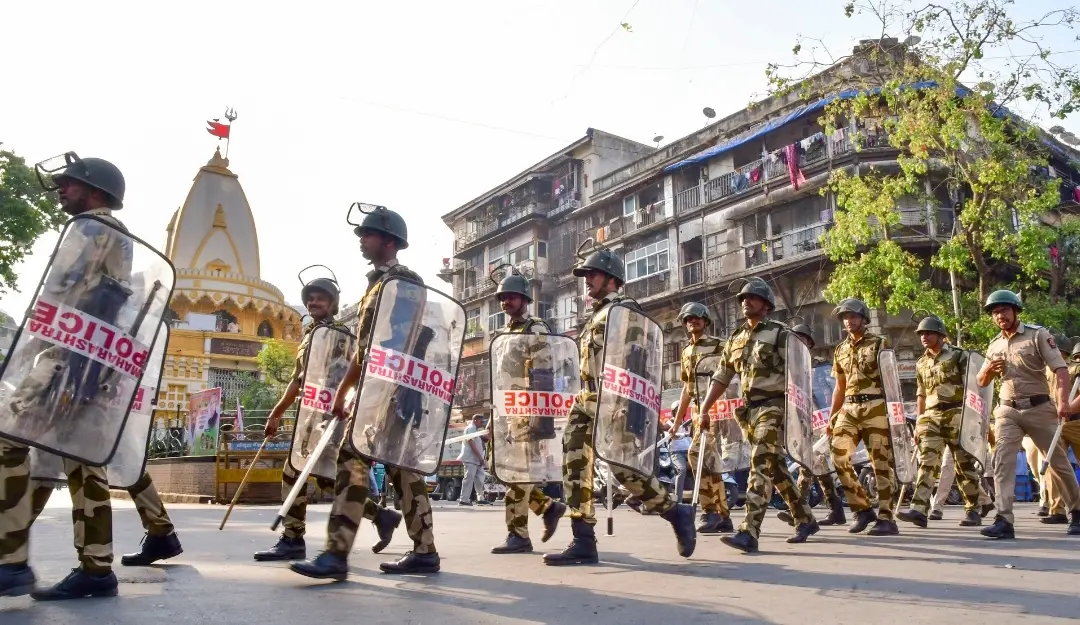 Mumbai Police personnel conduct a route march. | File image: PTI