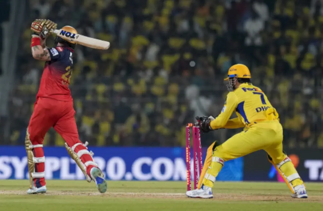 Chennai Super Kings' MS Dhoni takes the bails off to dismiss Royal Challengers Bengaluru's Phil Salt during an Indian Premier League (IPL) 2025 T20 cricket match between Chennai Super Kings and Royal Challengers Bengaluru, at the MA Chidambaram Stadium, in Chennai. | Photo: PTI