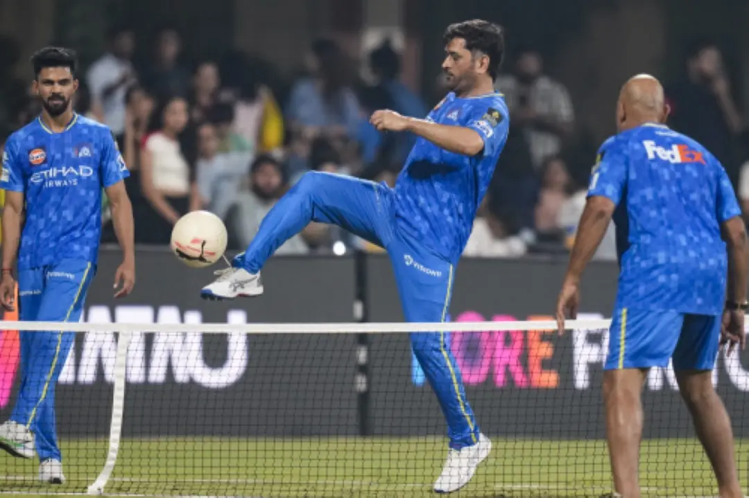 Chennai Super Kings' captain Ruturaj Gaikwad, left, and MS Dhoni, center, during a practice session ahead of an Indian Premier League (IPL) 2025 T20 cricket match between Chennai Super Kings and Royal Challengers Bengaluru, at the MA Chidambaram Stadium, in Chennai. | Photo: PTI