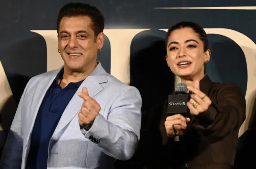 Bollywood actor Salman Khan with Rashmika Mandanna (R) attends trailer launch of their upcoming film 'Sikandar' in Mumbai. | Photo: AFP