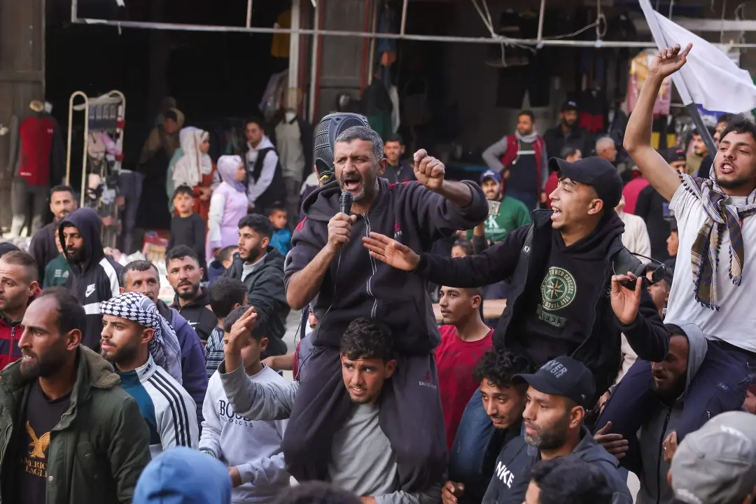 Palestinians attend a rally calling for an end to the war, in Beit Lahia, in the northern Gaza Strip | AFP
