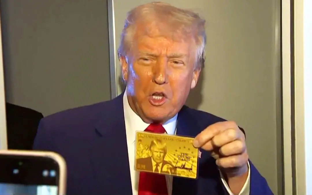 Donald Trump shows the gold card on board Air Force One
