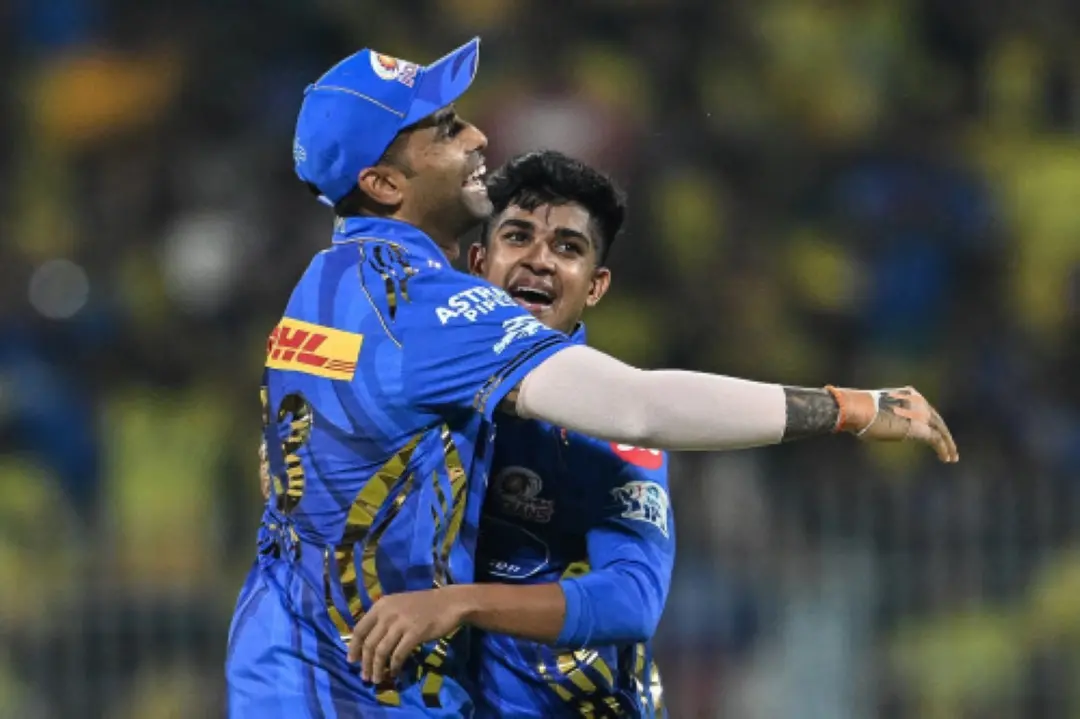 Mumbai Indians' Vignesh Puthur (R) celebrates with captain Suryakumar Yadav | Photo: AFP