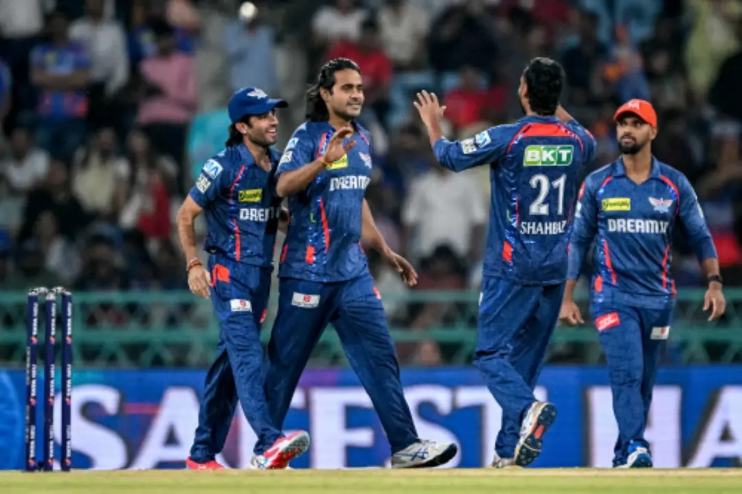 Lucknow Super Giants' Digvesh Rathi (2L) celebrates with teammates after taking the wicket of Punjab Kings' Priyansh Arya during the Indian Premier League (IPL) Twenty20 cricket match between Lucknow Super Giants and Punjab Kings at the Ekana Cricket Stadium in Lucknow. | Photo: AFP