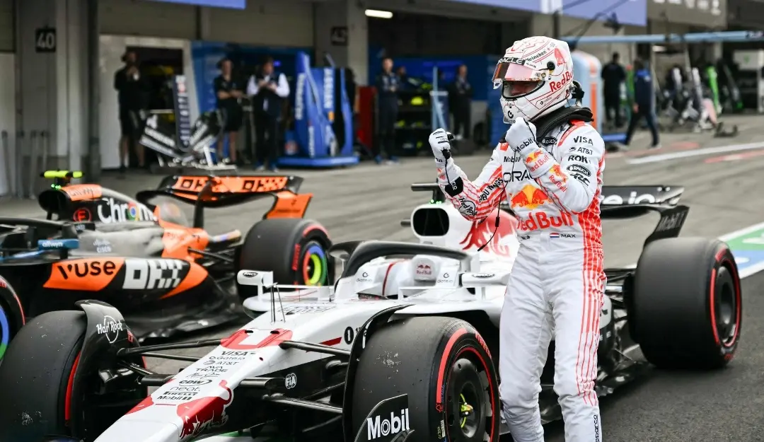 Red Bull Racing's Dutch driver Max Verstappen celebrates taking pole position in the qualifying session of the Formula One Japanese Grand Prix at the Suzuka circuit in Suzuka. | Photo: AFP