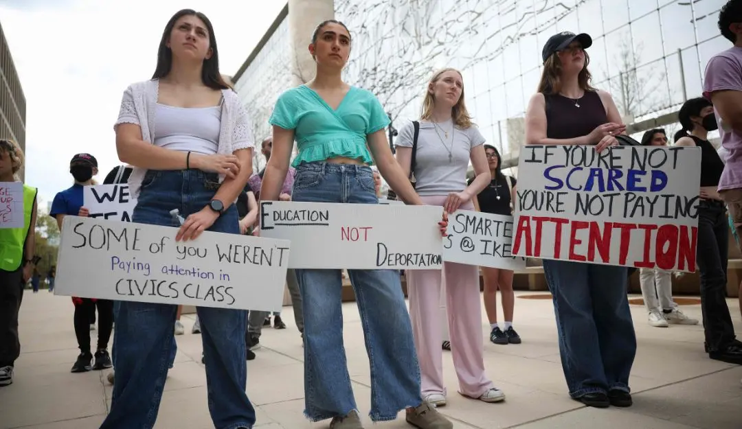 Georgetown students participate in the 'Hands Off Our Schools' rally in front of the U.S. Department of Education (Photo: AFP)