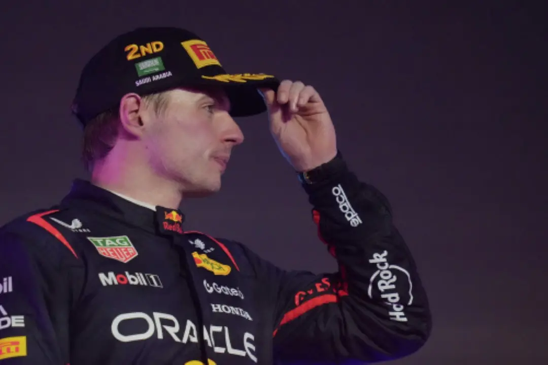 Second placed Red Bull driver Max Verstappen of the Netherlands gestures on the podium during the Formula One Saudi Arabian Grand Prix at the Jeddah Corniche Circuit in Jeddah, Saudi Arabia. | Photo: AFP