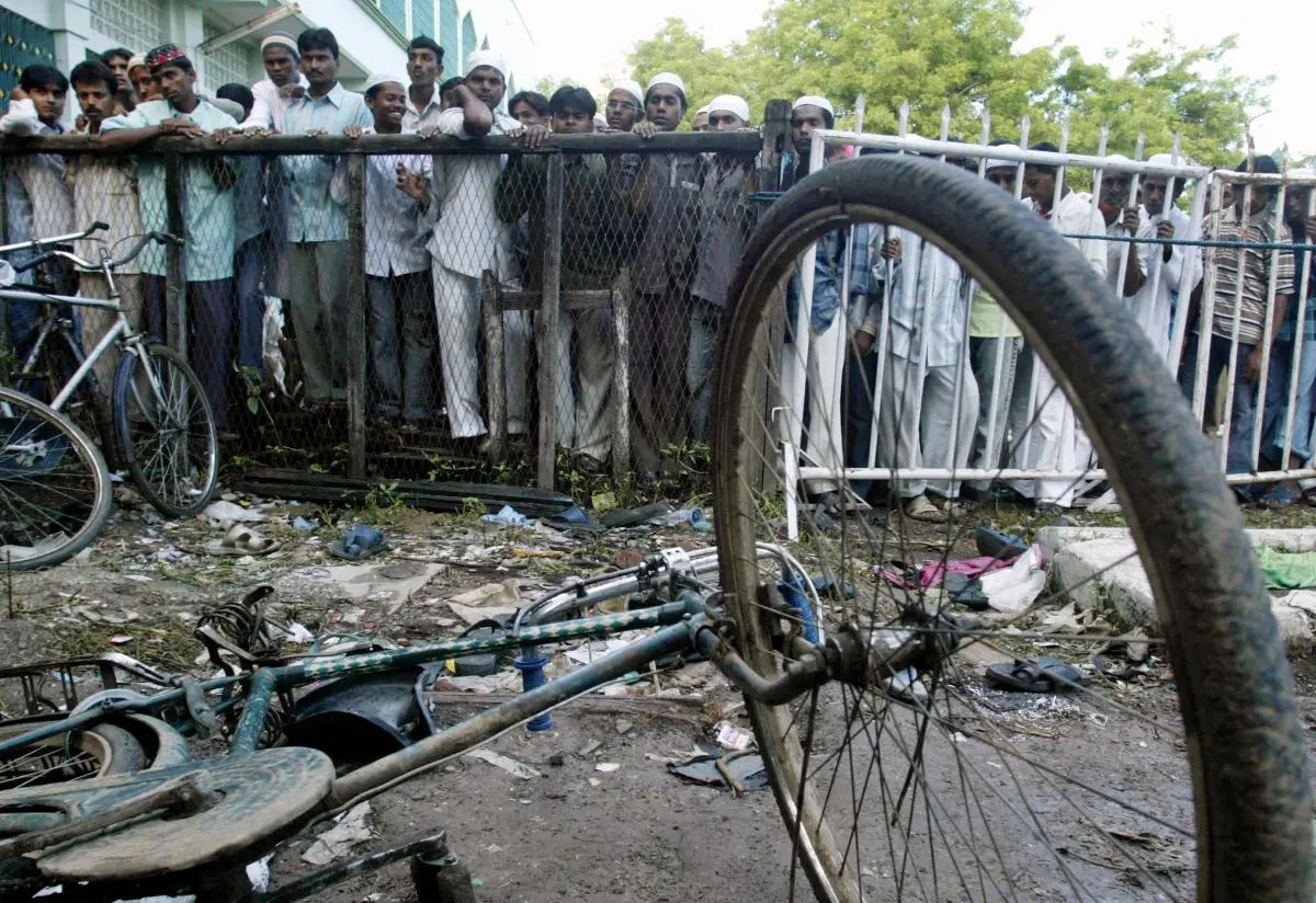 People look towards the spot where a bomb exploded near a mosque in Malegaon | File photo: AP