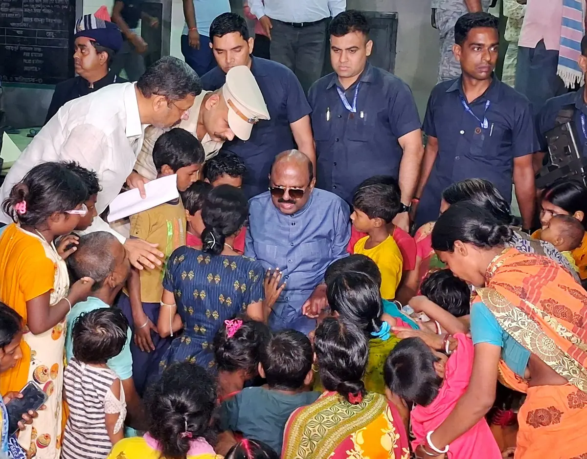 West Bengal Governor CV Ananda Bose meets the families affected by the Murshidabad violence at a shelter home | Photo: ANI