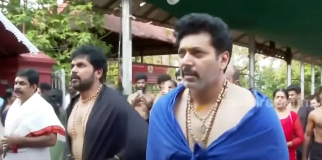 From (L) Karthi and Jayam Ravi during temple visit. | Photo: Screengrab/ Mathrubhumi News