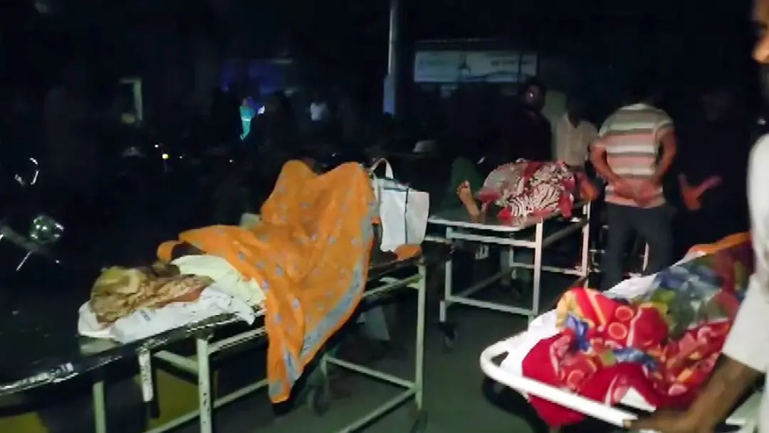 Patients being evacuated after a fire broke out at Lok Bandhu Hospital, in Lucknow
