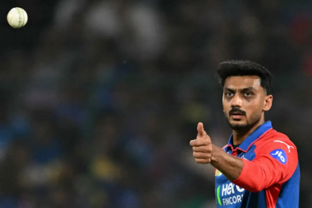 Delhi Capitals' captain Axar Patel throws the ball during the Indian Premier League (IPL) Twenty20 cricket match between Delhi Capitals and Mumbai Indians at the Arun Jaitley Stadium in New Delhi. | Photo: AFP