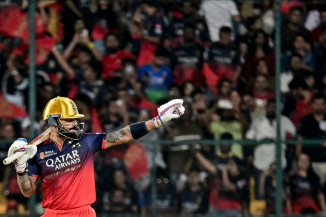 Royal Challengers Bengaluru's Virat Kohli gestures during the Indian Premier League (IPL) Twenty20 cricket match between Royal Challengers Bengaluru and Delhi Capitals at the M Chinnaswamy Stadium in Bengaluru. | Photo: AFP