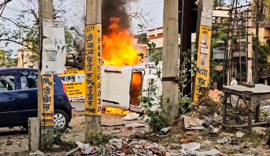 Flames billow out after a vehicle was set on fire during a protest over the Waqf (Amendment) Act (Screengrab: PTI)