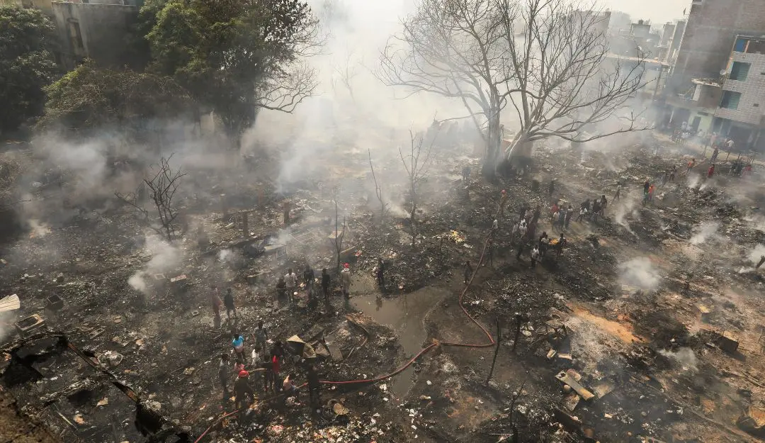 Firefighters try to douse a fire that broke out in the slums of Rohini, in New Delhi (Photo: PTI)