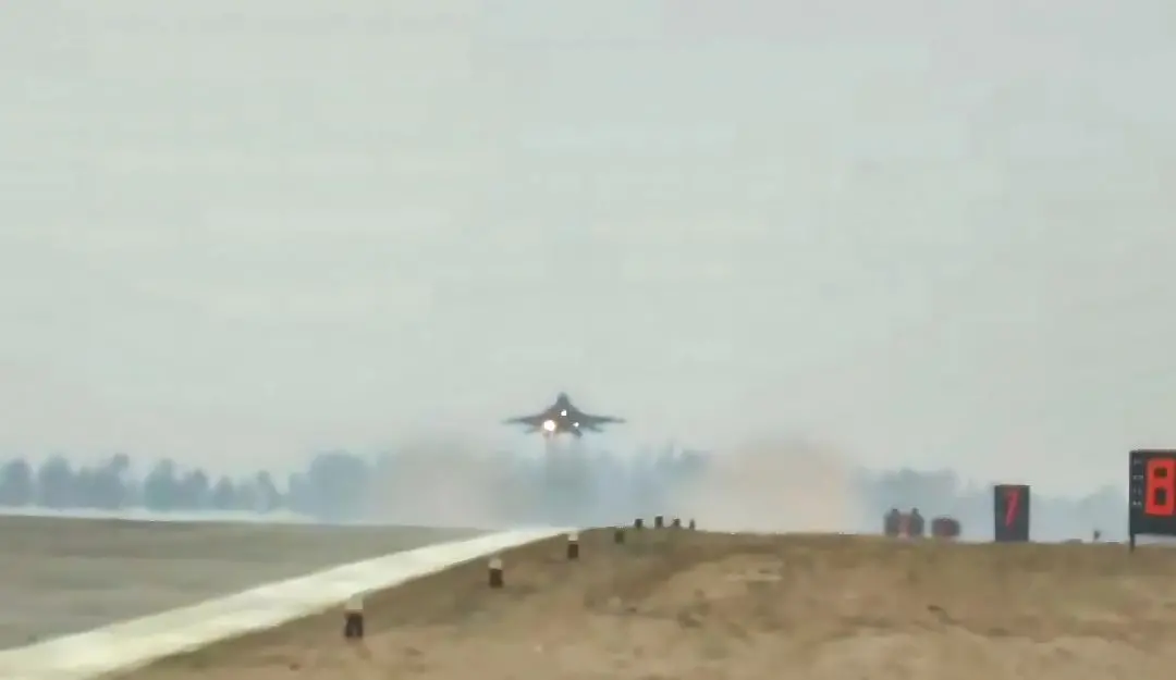 A fighter plane prepares to touch down as Indian Air Force conducts trial on the airstrip of the under-construction Ganga Expressway in Shahjahanpur on Friday, May 2, 2025.